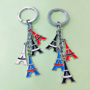 Fashion Keyring Keychains Paris Eiffeltornet Chaveiros Classic Frankrike Färgglada resergåva Speciella teckningar Härlig metallväska Frisk ryggsäck Bilhänge Nice K001