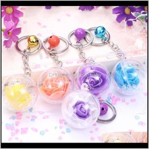 Keychains Fashion Accessories Drop Delivery 2021 Creative Metal Bell Eternal Flower Rose Bottle Alloy Women Ring Pendant Key Chain Xizwr
