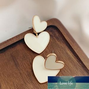 Nuovo coreano dolce smalto bianco doppio cuore orecchini per le donne strass ECG cuore vuoto orecchini pendenti accessori per gioielli prezzo di fabbrica design esperto qualità
