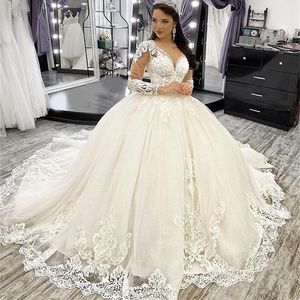2022 Princess Ball Gown Wedding Dresses Long Sleeve Appliques Lace Sexy Open Back Sheer V-Neck Court Train Winter Autumn Chapel Bride Formal Dress