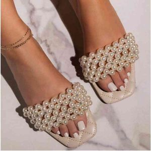 2021 Nya Kvinnor Pearl Beach Skor Flat Kvinna Sandaler Sträng Pärla Sommar Kvinna Skor Lady Fashion Slippers Söt Designer Slides Y0406