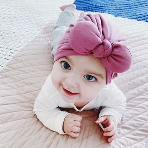 Gullig Bowknot baby hatt godis färg spädbarn toddler mjuka bomull Turban hattar keps för presentparty grossist pris