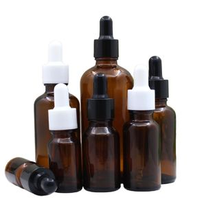 空のガラス滴のバイアル茶色の包装びんの黒人ホイトキャップ5ml 10ml 15ml 20ml 30ml 50ml 100ml化粧品のエッセンシャルオイルエッセンスエマルジョンの詰め替え可能な容器