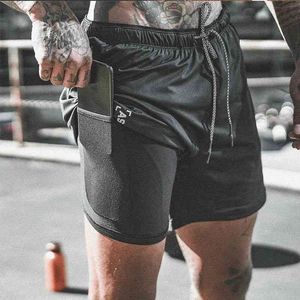 Neue Sommer-Doppelschicht-atmungsaktive Herren-Fitness-Schweiß absorbierende und schnell trocknende Outdoor-Fitness-Freizeit-Joggingshorts 210329