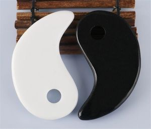 Factory White Black Gua Sha Massage Real Natural Jade Stone Tai Ji kształt na skrobanie twarzy i ciała skóry spa podnoszące narzędzie krążenia krwi