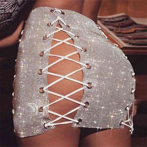 Luxo Glitter Metal Cristal Diamantes Saias das Mulheres Escavar Diamantes Rhinestone Lace Up Sexy Clubwear Nightclub Mini Skirt 210401