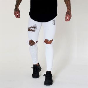 Wihte Men Knee Strapped Holes Skinny Destroyed Jeans Fashion Slim Fit Hip hop Mens Streetwear Cotton Jeans da jogging di alta qualità 211104