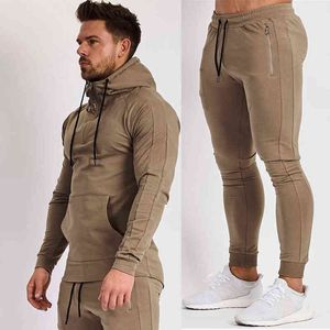 Running Sportswear Hoodies Byxor Satser Män Höst Joggers Sport Sweatshirt Sweatpants Gym Fitness Apparel Male Cotton Tracksuits Y1221