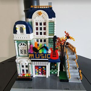 YC20008 Musical Instrument Store Modulare MOC Street View Kreative Stadt Architektur Serie Spielzeug Bausteine Kinder Geschenke