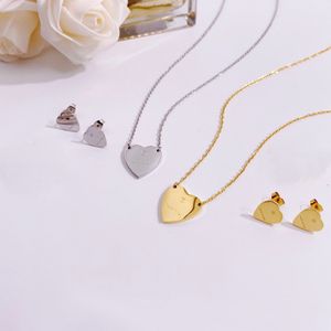 Set di gioielli di moda Europa America Set di collane per orecchini in oro placcato 18 carati da donna Lady Titanium con ciondolo a forma di cuore con lettera G