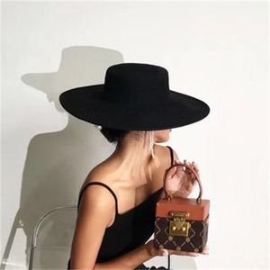 Autumn and winter new flat-top woolen top hat and big eaves hats
