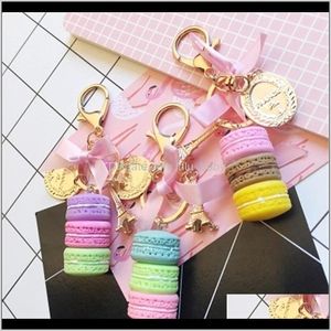 Nyckelringar Aessory Aron Cake Chain Fashion Cute Keychain Bag Charm Car Key Ring Wedding Party Gift Jycken för kvinnor Män 1142 Q2 Drop Deliv