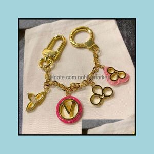 Nyckelringar smycken mode blomma design nyckelring charm för män och kvinnor party älskare gåva nyckelring nrj drop leverans 2021 Qzkce