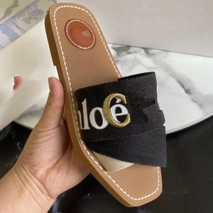 Mais novo Branded Mulheres Woody Mules Fllat Slipper Deisgner senhora Lettering Tecido Outdoor Leather Sole Sandal MM0004