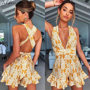 Casual Short Summer Jumpsuits Kvinnor Sexig Mini Playsuit Ärmlös Backless Boho Floral Print Lace Up Sexy V Neck Beach Rompers 210415