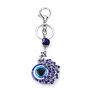 Keychains Stainless steel key ring, bad eyes, 15 different styles of animals, fluffy pendant, fashionable blue pattern, mens and womens jewelry