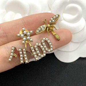 small bee asymmetric earrings women's sterling silver needle 2020 new niche letter earrings brass earrings