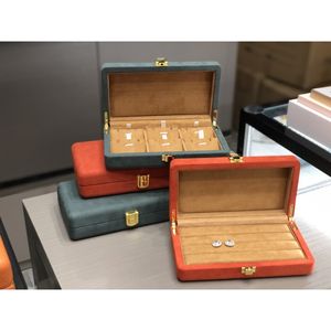 Kosmetiska påsar Orange Box Luxurys Desig Glamours Att hålla smycken Makeup Transparenta Plexiglass Glänsande Metall Ornamental Boxs Dressing Table Case Watch Accessorie