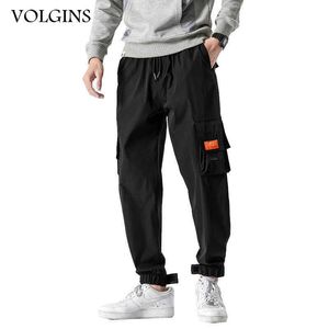 Pantaloni cargo streetwear da uomo con coulisse allentata molte tasche pantaloni da jogging pantaloni neri hip-hop maschili pantaloni casual plus size 5XL Y0927