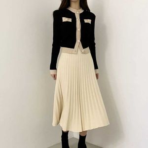 Autumn Winter Chic Single Breasted Cardigan Sweater+Pleated Long Skirt Suit High quality casual Knitted 2 Piece Set 210529