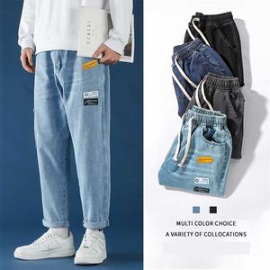 Mens coreano Moda Blue Jeans Calças Vintage Harajuku Baggy Belt Alta Qualidade Denim Harem 211108