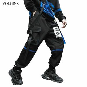 Streetwear Mężczyzna Jogger Spodnie Boczne Kieszenie Wstążki Luźne Styl Męskie spodnie dresowe Moda 2021 High Street Casual Spodnie Spodnie Y0927