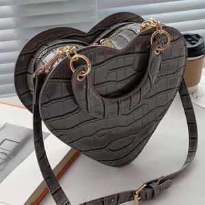 حقائب السهرة على شكل قلب حقيبة حمل للنساء 2021 ستون نمط بو الجلود Crossbody أنثى صغيرة الكتف لطيف حقيبة يد العلامة التجارية