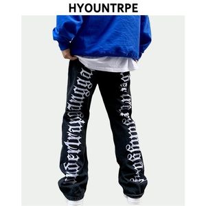 Moda de volta Letras Bordado Bordado Denim Flare Jeans Mens Zipper Calças Hip Hop Destroy Holes Streetwear Calças Jogadores 211111