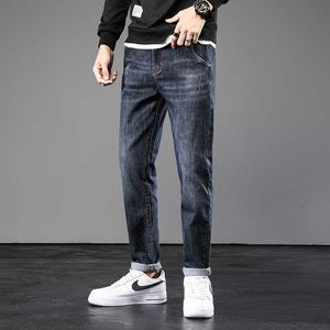 Ly designer mode män jeans vintage blå slim passform casual bomull denim elastiska harem byxor koreanska stil breda ben byxor