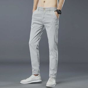 Męskie jasnoszary Slim Fit Casual Spodnie 2021 Jesień Nowy Moda Biznes Elastyczność Solidna Kolor Spodnie Male Lake Blue Black Y0811