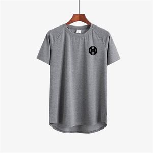 Odzież marki Moda Slim Fit T Shirts Mężczyźni Krótki Rękaw T-Shirt Fitness Topy Tees Bawełniane Patchwork Mesh Kulturystyka Koszula 210421