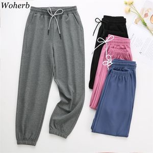 Casual Drawstring Sweatpants Kvinnor Höst Vinter Lös Solid Elastisk Midja Koreansk Fashion Modis Harem Byxor Femme 210519