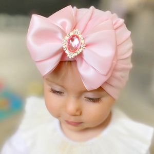 赤ちゃん帽子キャップビッグボウターバンヘアBOWKNOTラインストーンヘッドラップ新生児子供の耳カバー幼児子供3層弓ビーニーソリッドカラーKBH68