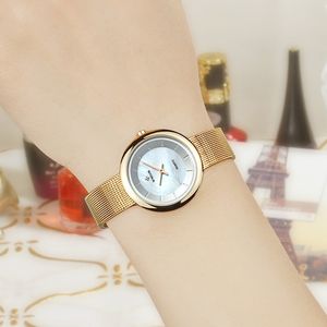 Snygg Luxury Gold Es Wwoor Women Quartz Ladies Armband Wrist Watch Klänning Presentklocka Kvinna Relogio Feminino