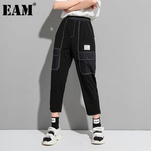 [EAM] Svarta fickor hög elastiska midja byxor lös passform harem kalvlängd byxor kvinnor mode vår sommar 1dd8100 210512