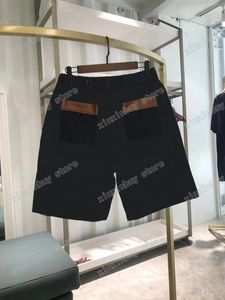 22ss męskie damskie designerskie spodenki jeansowe spodnie skórzane kieszonkowe litery żakardowe wiosenne letnie męskie spodnie parciane Casual listowe spodnie niebieski xinxinbuy