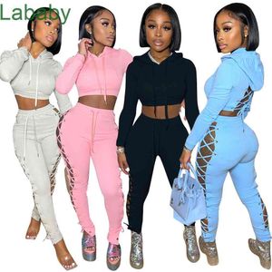 Women Tracksuits Two Pieces Set Deisgner Autumn And Winter Corns Bandage Solid Color Pants Sexy Hollow Out Sweater Leggings Outfits