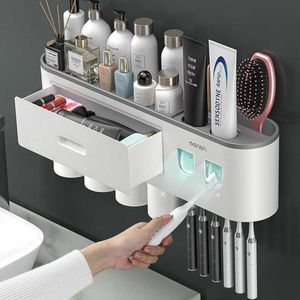 Portaspazzolino rovesciato ad adsorbimento magnetico Doppio distributore automatico di spremiagrumi per dentifricio Rack di stoccaggio Accessori per il bagno 210709