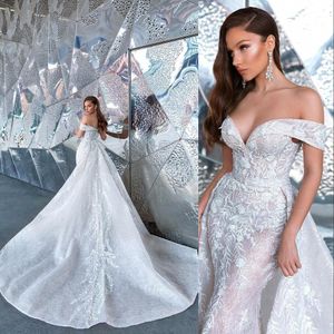 2021 Bling Luxury Mermaid Bröllopsklänningar Brudklänningar Av Axel Illusion Lace Appliqued Sequined Beads Overskirts Avtagbar Tåg Champagne Plus Storlek