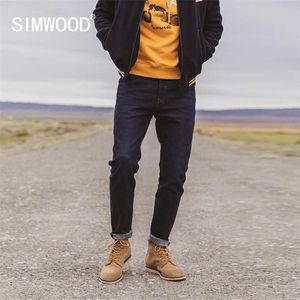 Zimowa podszewka polarowa Slim Fit Stożkowa dżinsy Mężczyźni Przyjazny dla środowiska Laser Water Myed Denim Spodnie SK130131 211008