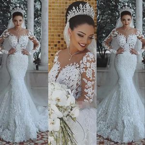 2021 Overskirts di lusso Abiti da sposa a sirena Abiti da sposa formali Collo trasparente Perline Appliques di pizzo di cristallo Maniche lunghe arabe Plus Size Treno staccabile