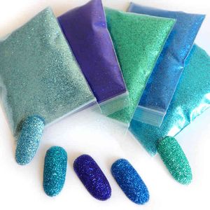 9色のキラキラの粉の粉はすべてデザインシニークロム顔料の塵の釘の供給専門家のマニキュアスパンコール