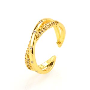Criss-Cross CW CZ Crystal X-Ring für die rechte Hand mit minimalistischen geometrischen Kreis-Eheringen mit 14-Karat-Gelbgoldfüllung