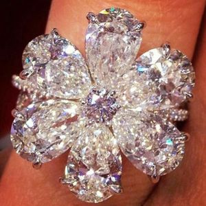 Anéis De Acoplamento Em Forma De Flor venda por atacado-Zhenrong casamento anel de noivado jóias embutidos branco zircão pera em forma de flor de neve khal
