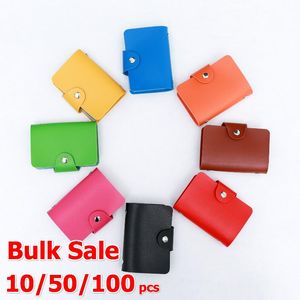 Titulares de cartão 10/50/100 pçs/lotes Atacado Titular de identificação em massa Pu Leather Wallet Vintage Organizer Case 24 Slots Travel Business Gifts