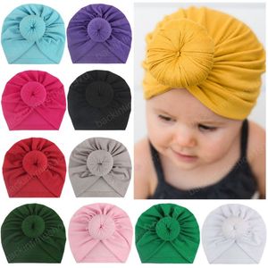 Tinta unita fatti a mano palla rotonda cappelli indiani infantili moda calda berretti ciambella neonato accessori per capelli per bambini regali di compleanno