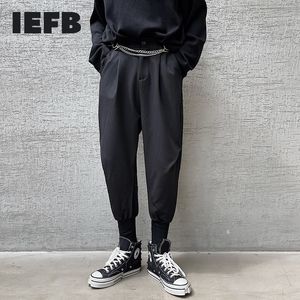 Calças causais dos homens de IEFB Calças personalizadas de nicho de turma Preto Solto Streetwear Calças de cintura alta Chian 9Y6695 210524