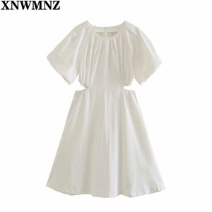 Kvinnor Chic Fashion Woman White Cotton Cut-Out Klänning Ankomst Puff Short Sleeve Ladies Knee Robe för Kvinnors 210520