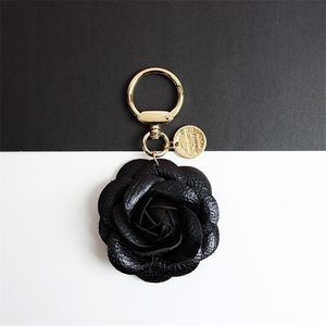 New 23ss womens Flower Keyrings Bag Charms Leather Pendant Car Key Chains Accessories Black White Rose Red Jewelry Rings Holder for Women Keychains