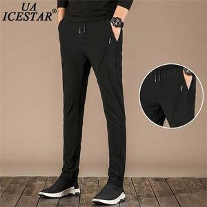Czarne spodnie sportowe Mężczyźni Lato Oddychające Szybkie Dry Casual Zipper Kieszonkowy Spodnie dresowe Mężczyźni Marka Moda Luźne męskie Spodnie 211108